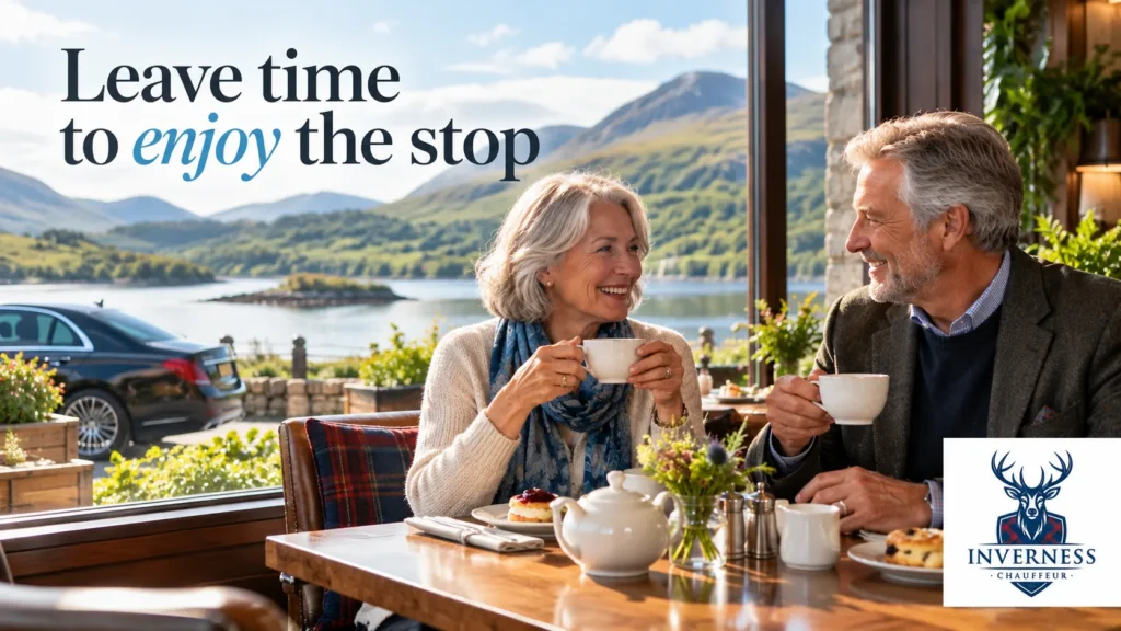 Older couple enjoying tea and scones at a lochside cafe with their chauffeur car parked outside